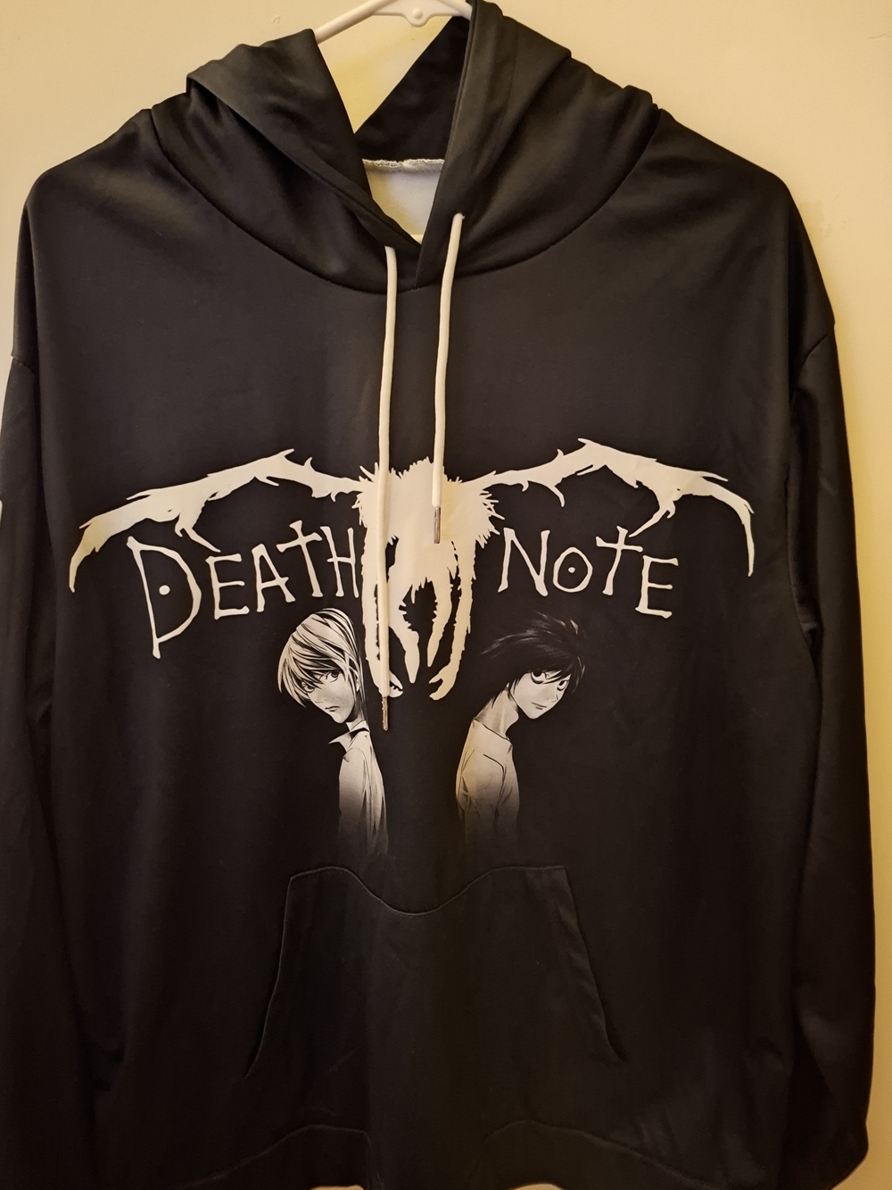Death Note hoodie Features Light yagami and L A silhouette of shinigami ryuk